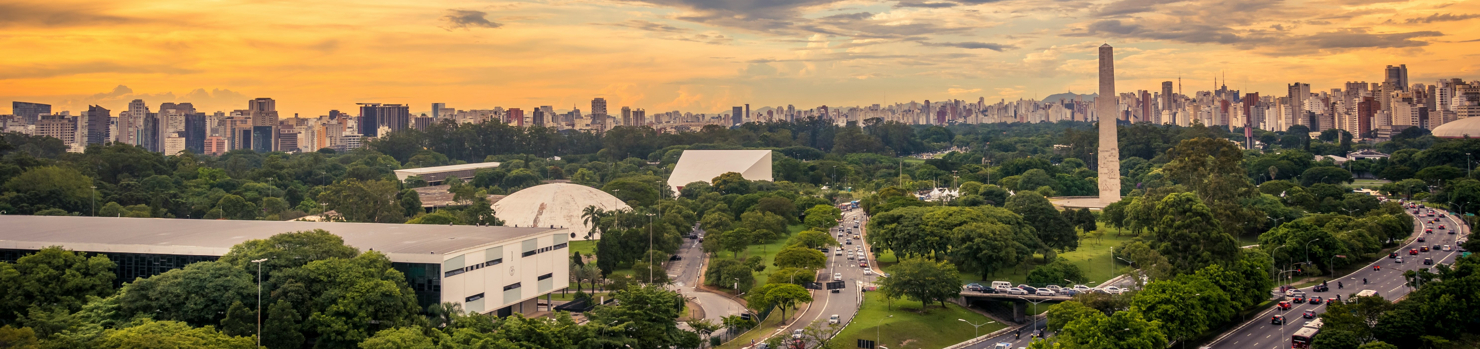 Ibirapuera Park, São Paulo, with the city skyline and the Ibirapuera obelisk — the park that has housed the Bienal's Ciccillo Matarazzo Pavilion since 1957.