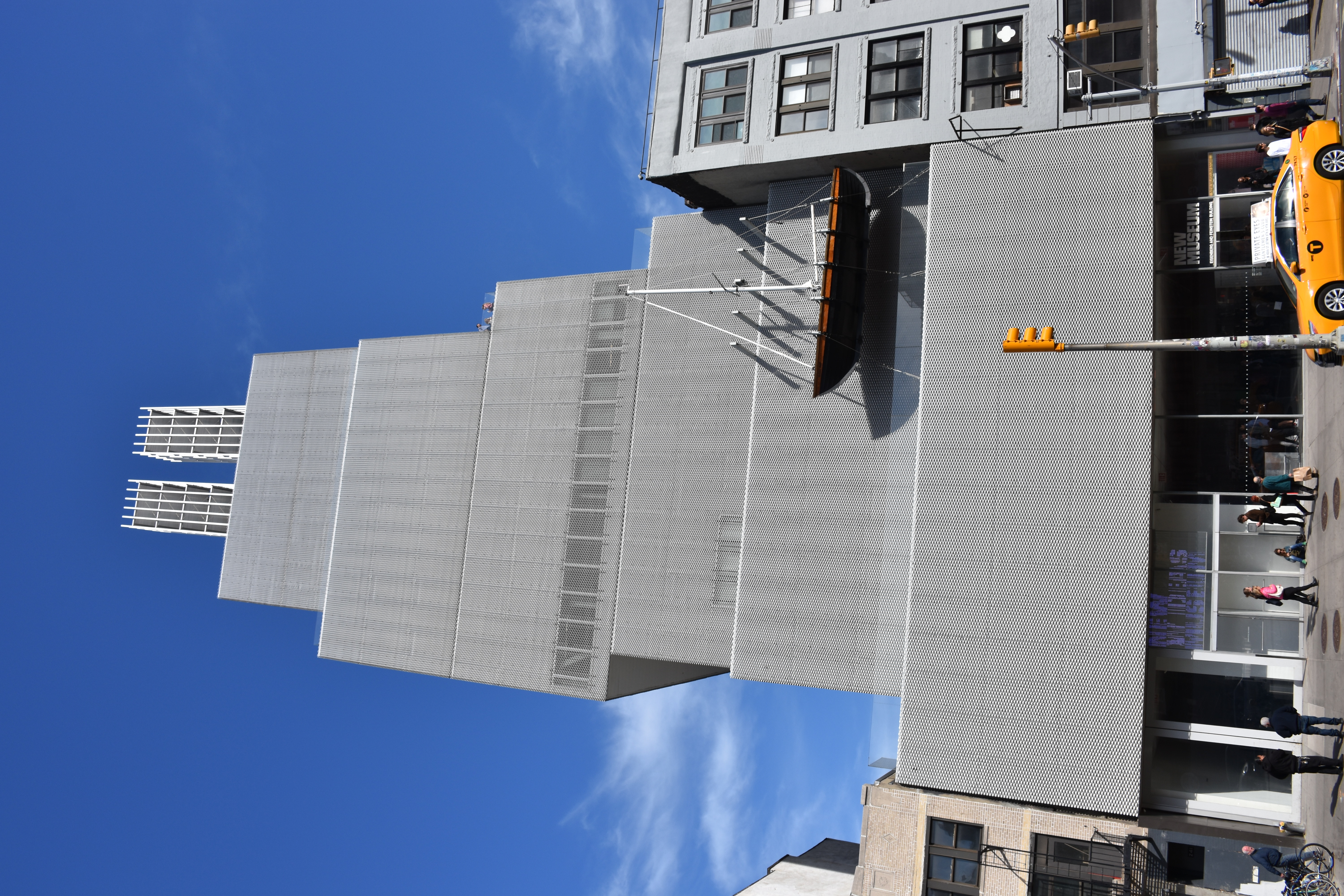 The New Museum building on the Bowery in Manhattan — the SANAA-designed seven-storey aluminium-mesh stack that opened in December 2007 and has hosted the New Museum Triennial since 2009.