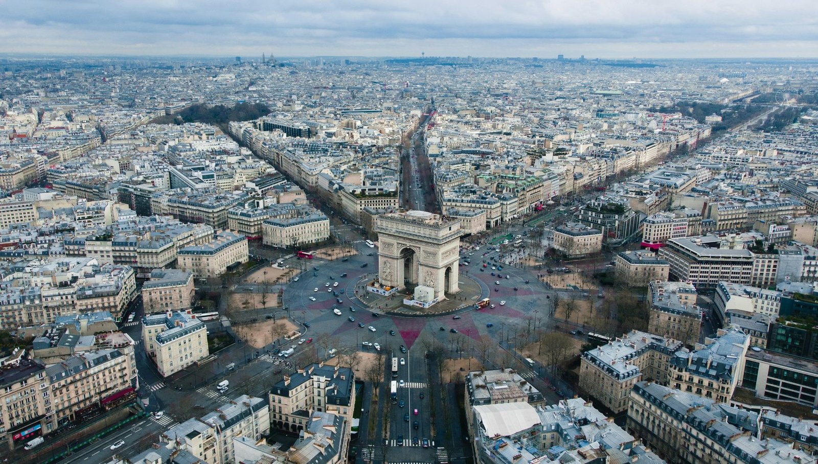 Aerial view of the Arc de Triomphe and the avenues radiating from it