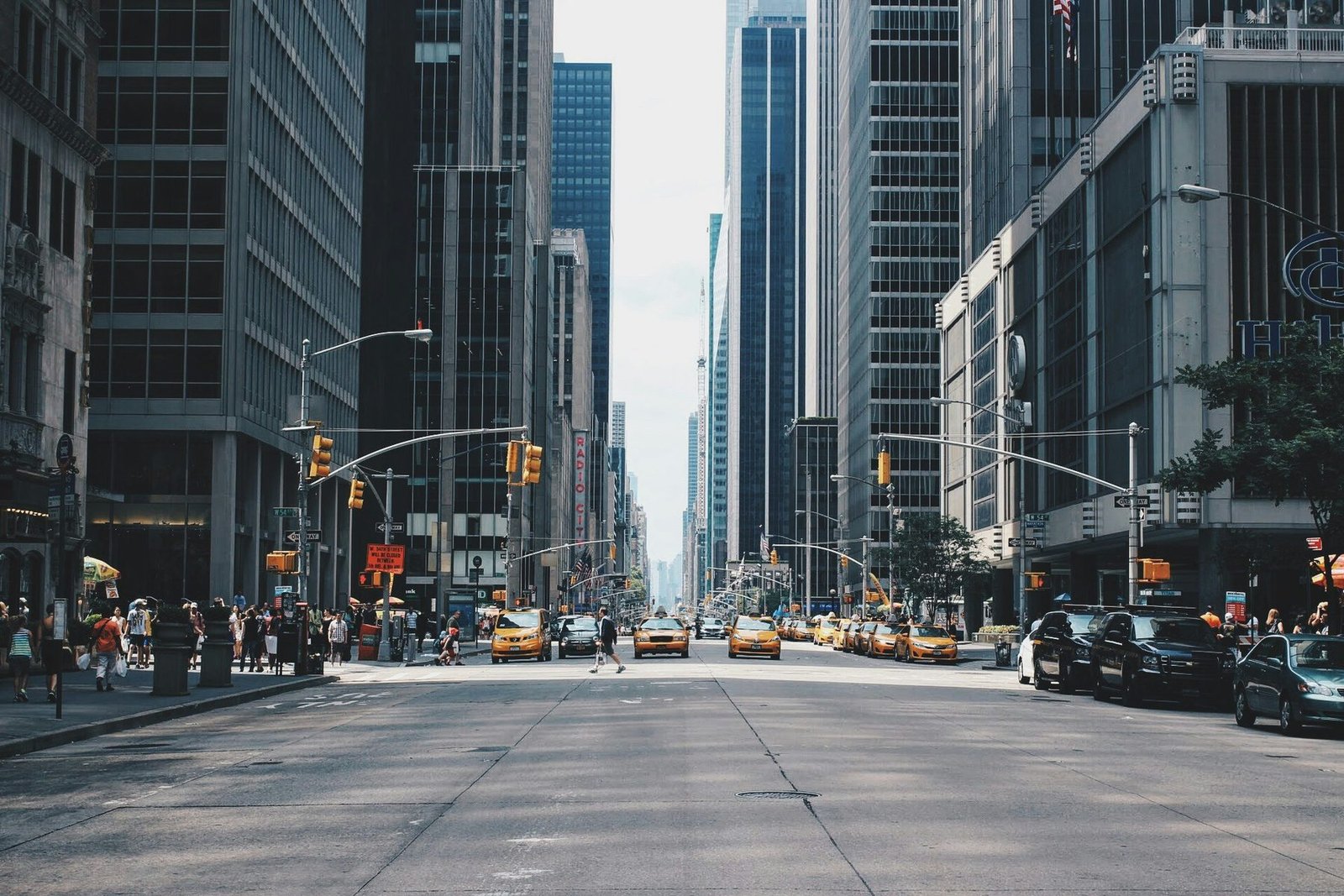 A Midtown avenue lined with glass towers