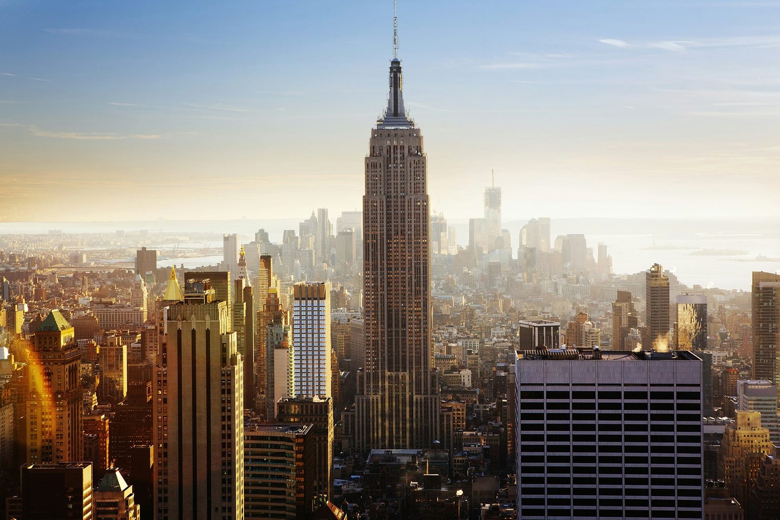 The Empire State Building above Midtown in low sun